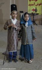 Cihildren in traditional costume, Dolat Abad Gardens, Yazd