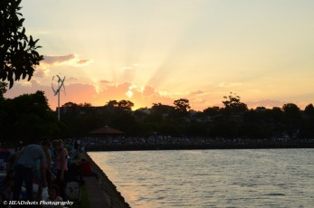 Sunset over the waiting crowd in the park